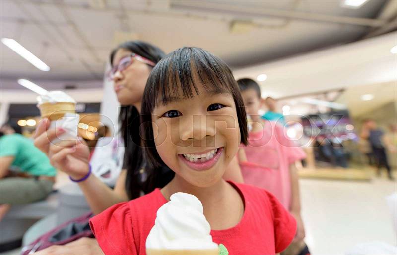 Asia Girl Eating Ice-Cream, stock photo