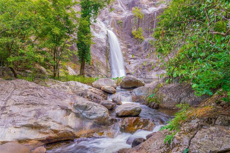 Waterfall in deep rain forest jungle. (Mae Re Wa Waterfalls Mokoju, Thailand), stock photo