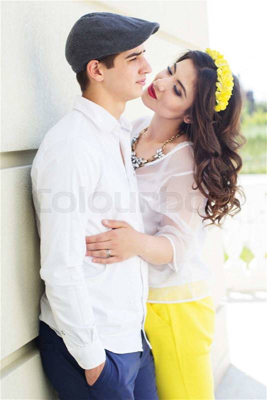 Young couple of teens girl and boy is wearing fashion white clothes, stock photo