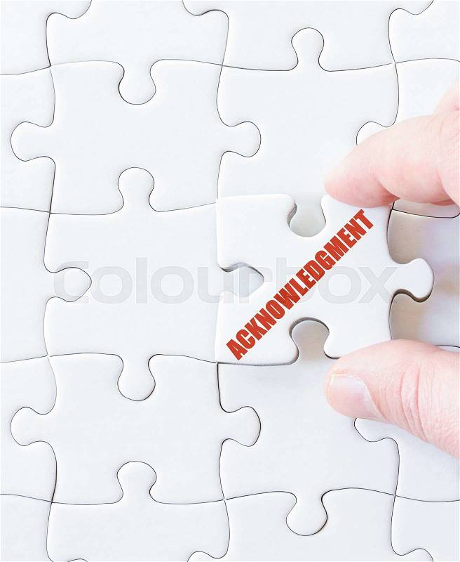 Last puzzle piece with word Acknowledgement. Concept image, stock photo