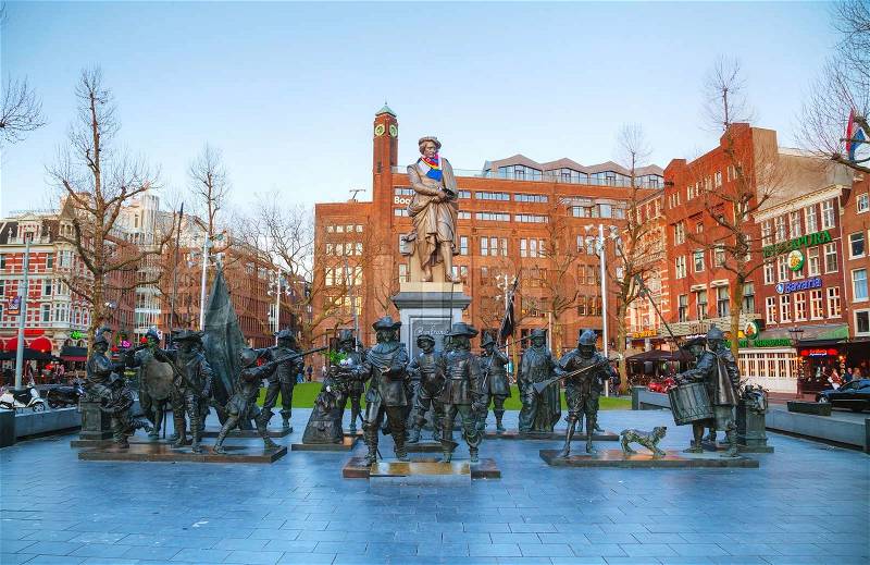 AMSTERDAM - APRIL 17: The Night Watch installation at Rembrandtplein on April 17, 2015 in Amsterdam, Netherlands. This bronze-cast representation is a part of the celebration of the artist\'s 400th birthday in 2006, stock photo