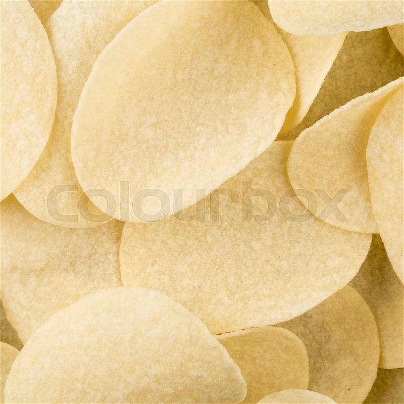 Prepared potato chips snack closeup view on white background, stock photo