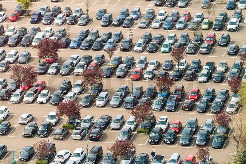 Aerial view of airport car crowded parking lot, stock photo