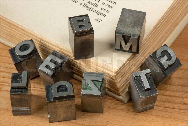 Old lead ink printing type from a book printing company. Historical metal letters from an old printing machine. Created and used in Netherlands in the middle of the last century, stock photo