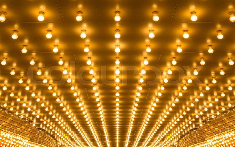 Golden bulbs marquee lights background, stock photo
