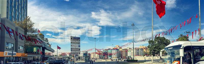 ISTANBUL, TURKEY - OCTOBER 23, 2014: People walking at Taksim Square in Istanbul. Taksim Square is a leisure district famous for its restaurants, shops, and hotels, stock photo