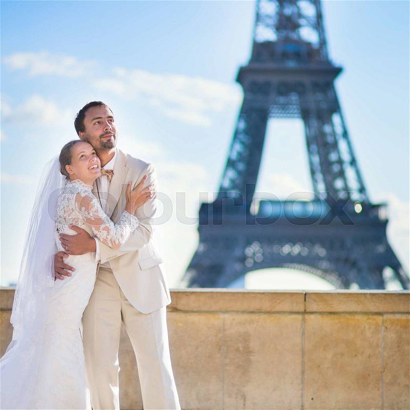 Happy just married couple in Paris, France, stock photo
