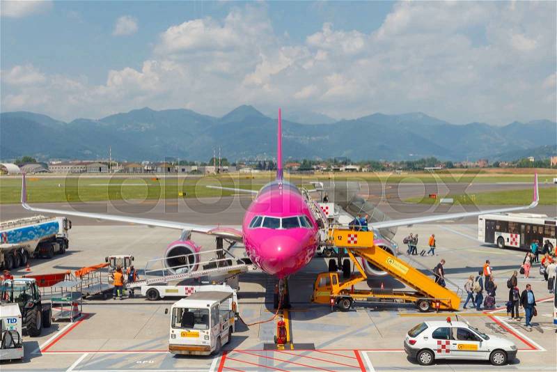 Bergamo, Italy - May 27, 2015: Wizz Air aircraft company at the airport of Bergamo. The company offers one of Wizz Air not expensive flight to Europe. The company flies to 29 countries, stock photo