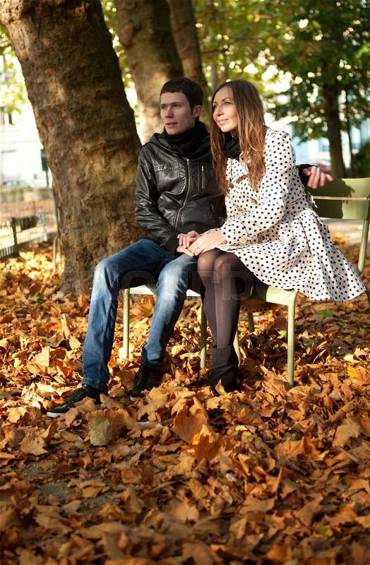 Young couple in the Luxembourg garden of Paris at fall, stock photo