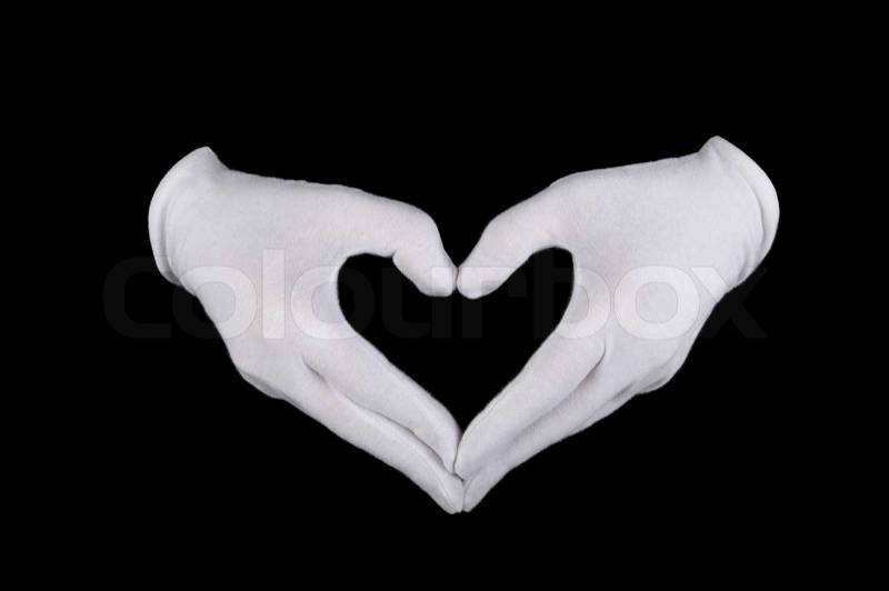 Hands in white gloves in the form of heart, stock photo