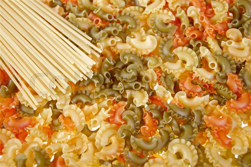 Italian pasta as background, pasta of different colors, stock photo