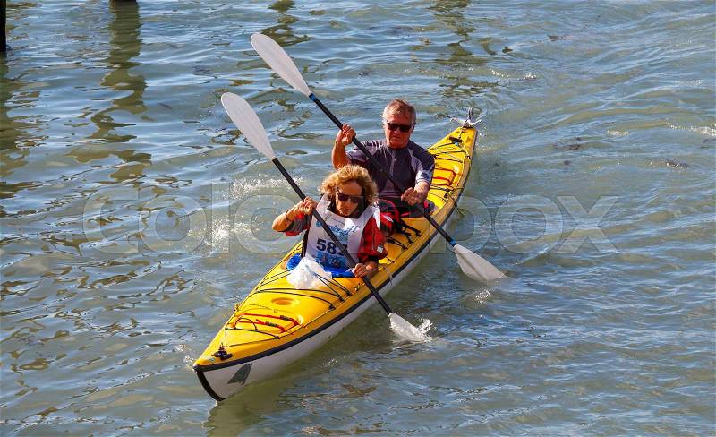 Venice, Italy - May 24, 2015: Racing rowing in the Venetian lagoon. The annual Vogalonga Regatta. In the race was attended by about 1,500 boats from around the world, stock photo