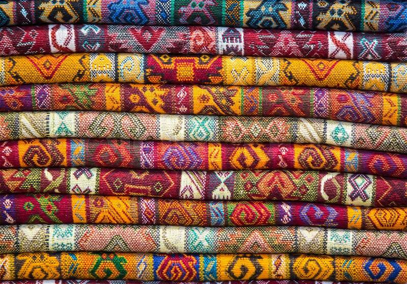 Background of the scrolls rolls colored colorful fabric, stock photo