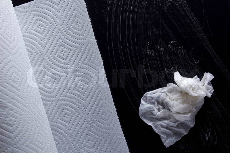 Roll of paper towels and a piece of wet towels and soap, stock photo