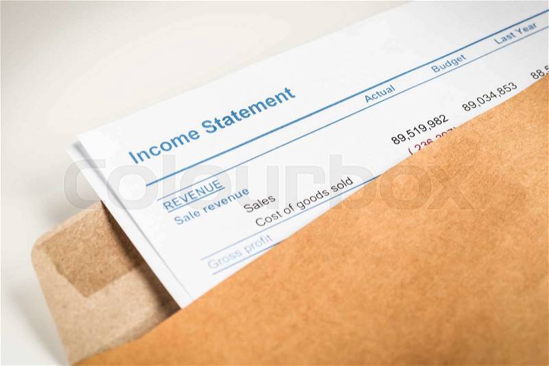 Income statement letter in brown envelope opening, business concept; document is mock-up, stock photo