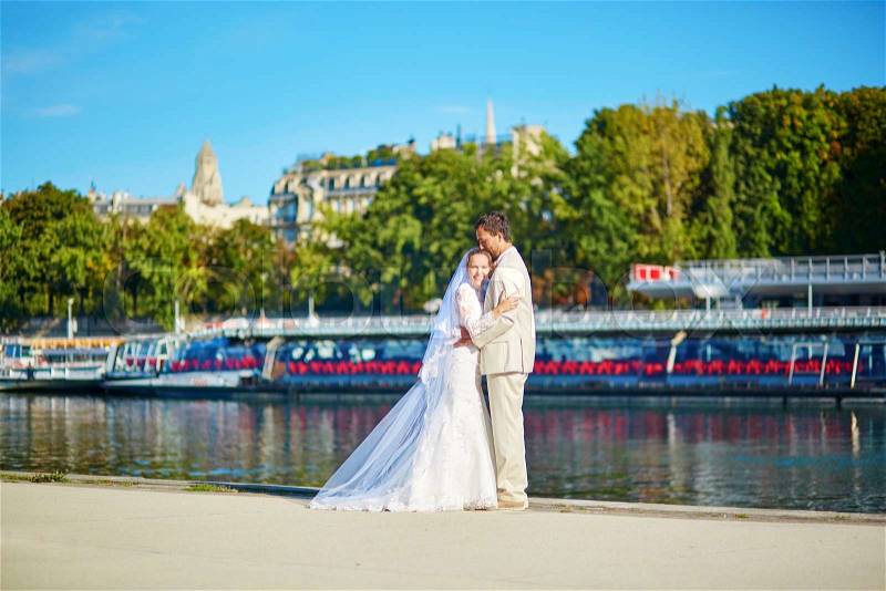 Beautiful just married couple in Paris, stock photo