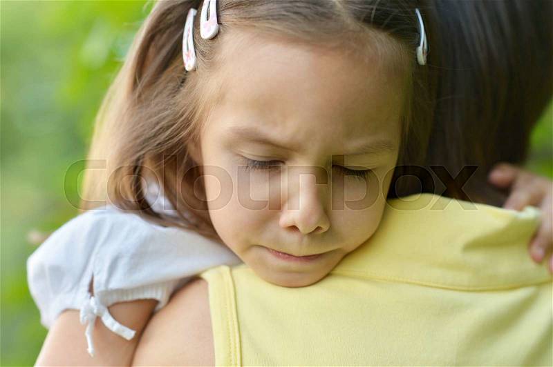 Mother with her sad daughter for a walk, stock photo