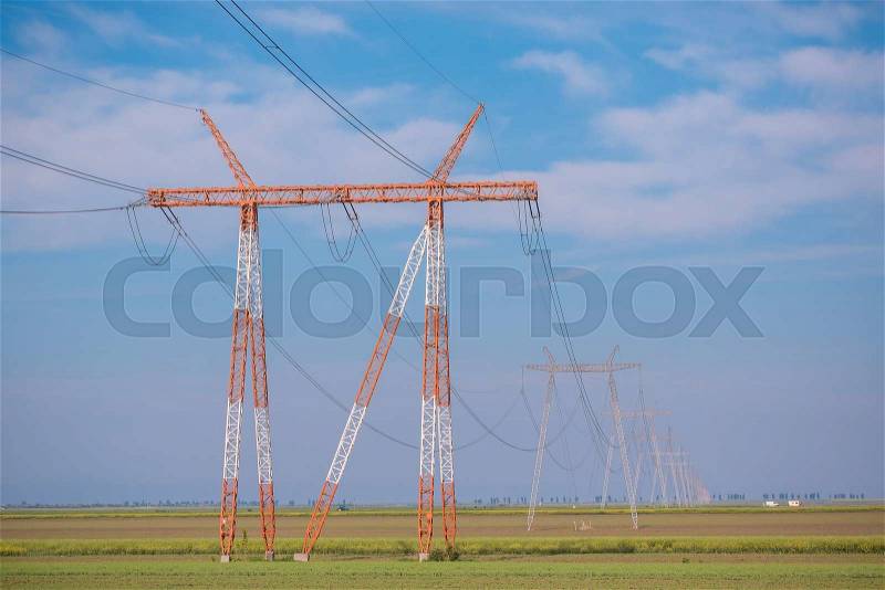 High voltage electrical line on te field, stock photo