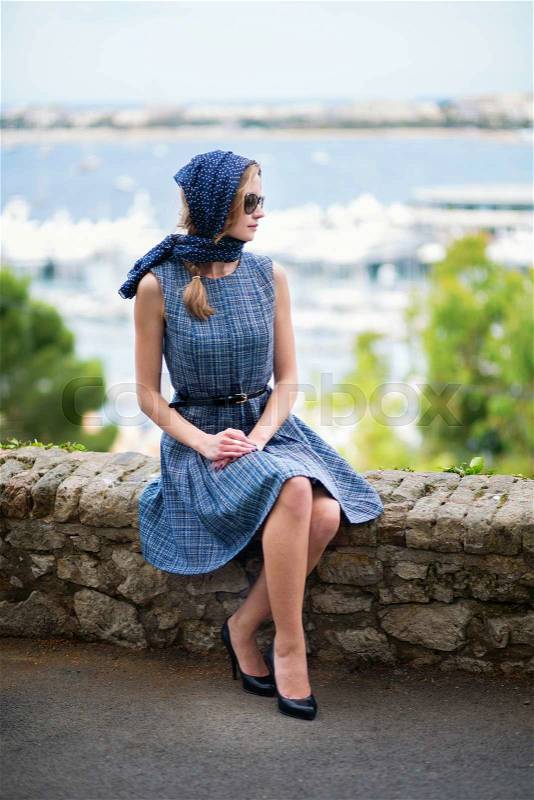 Elegant French woman in Cannes, at Le Suquet, stock photo
