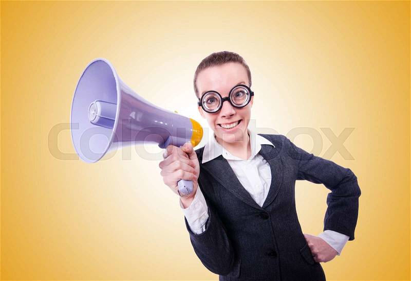 Young businessman with loudspeaker on white, stock photo