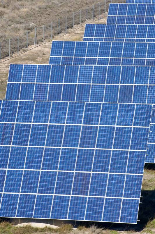 Photovoltaic panels detail in blue color in Mediana de Aragon, Saragossa, Aragon, Spain, stock photo