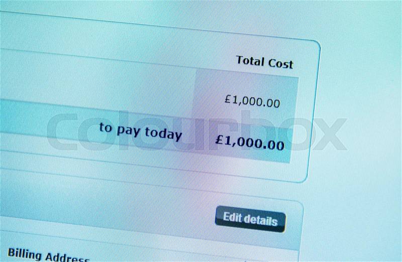 Electronic payment process seen on computer screen with instructions to pay 1000 UK Pounds - blue color cast for a closer pure and financial look, stock photo