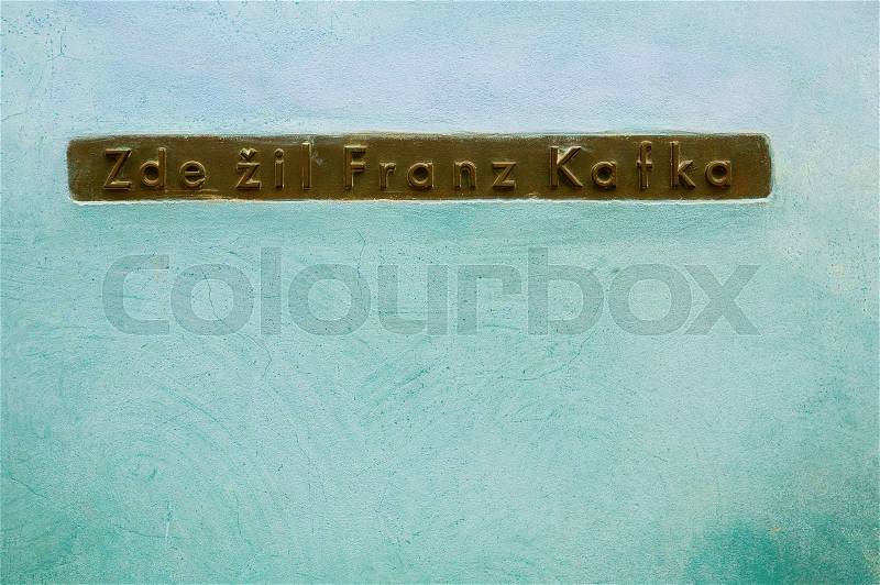 Franz Kafka lived here. Sign on the wall of a house in Prague where famous writer Franz Kafka lived, written in Czech language, stock photo
