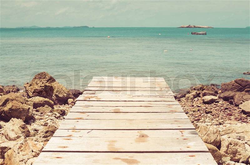 Dock rock and blue sea in Thailand vintage, stock photo