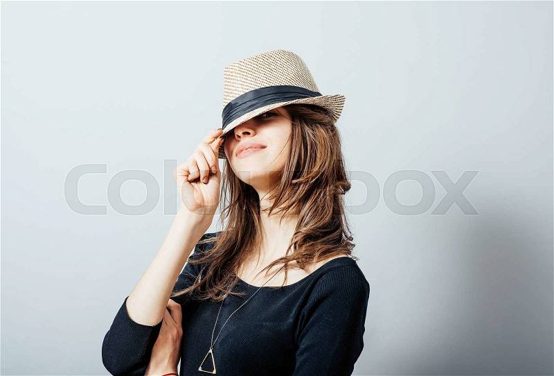 Portrait of a Beautiful Young Woman in hat, stock photo
