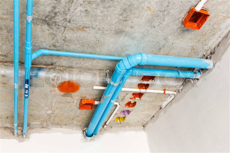 Close up electrical and sanitary distribution system installation in new building, stock photo