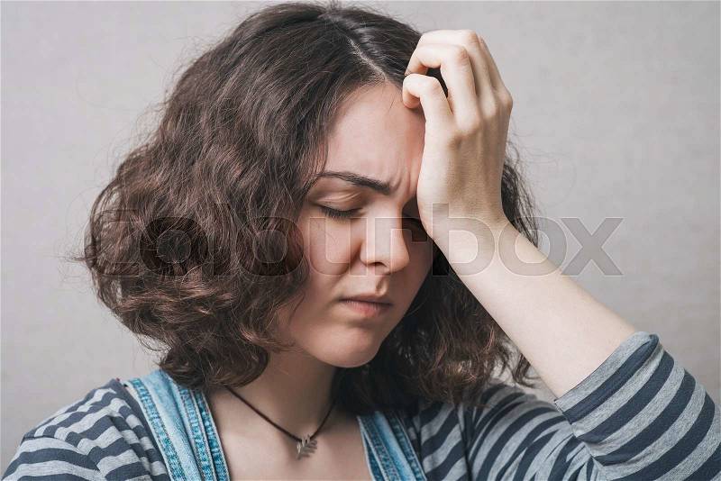 Headache. woman having a headache, stock photo