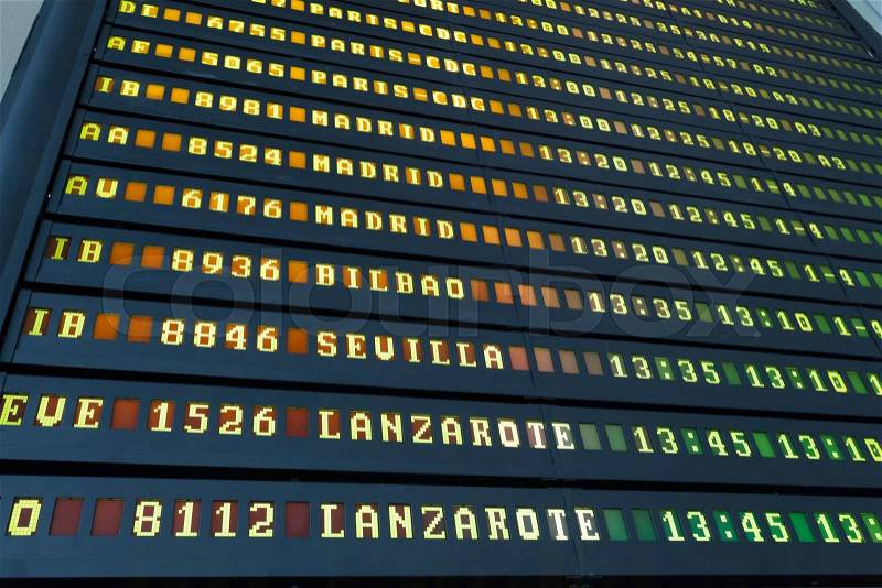 Departure schedule at an airport in Spain, stock photo