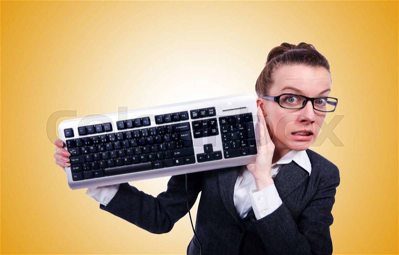 Nerd businessman with computer keyboard against the gradient, stock photo