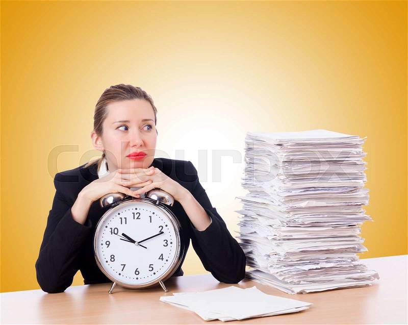 Woman businesswoman with clock and papers, stock photo