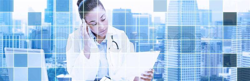 Health care, medicine, people and technology concept - african american female doctor with laptop reading medical report paper over city and blue monochrome grid background, stock photo