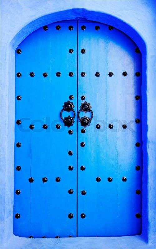 The doors made of wood painted blue, stock photo