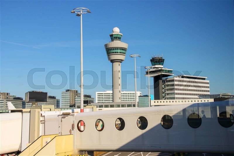 View the control tower and other buildings from the window of the airport, stock photo
