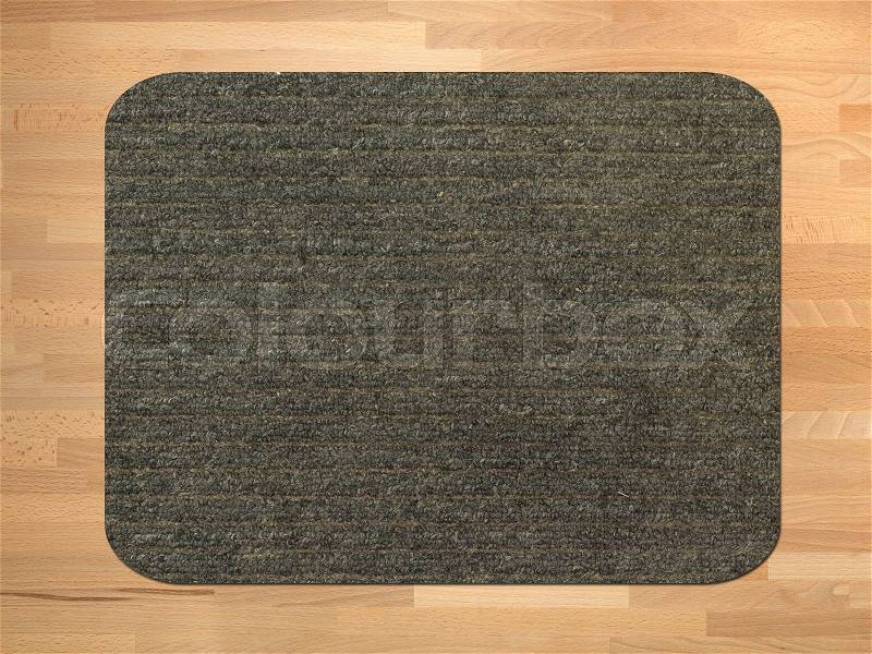 A close up shot of a door mat, stock photo