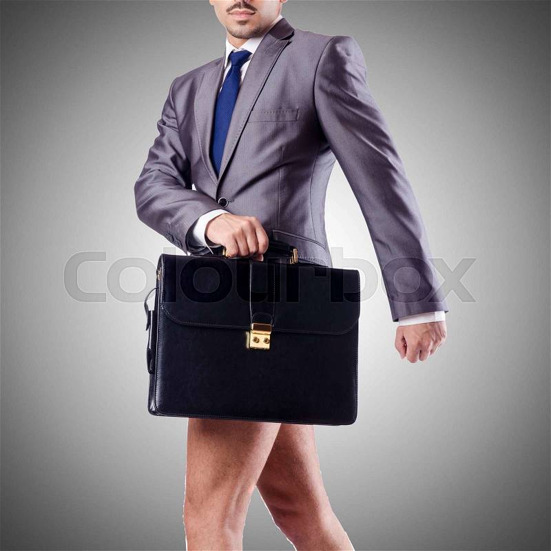 Nude businessman with briefcase against gradient , stock photo