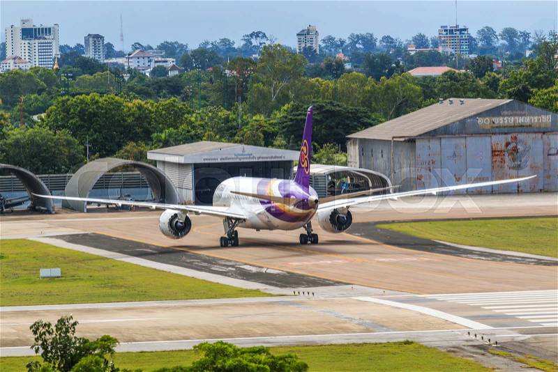 CHIANGMAI , THAILAND - July 26 2014: HS-TAN Airbus A300-600R of Thaiairway. Landing to Chiangmai airport from Bangkok Suvarnabhumi, stock photo