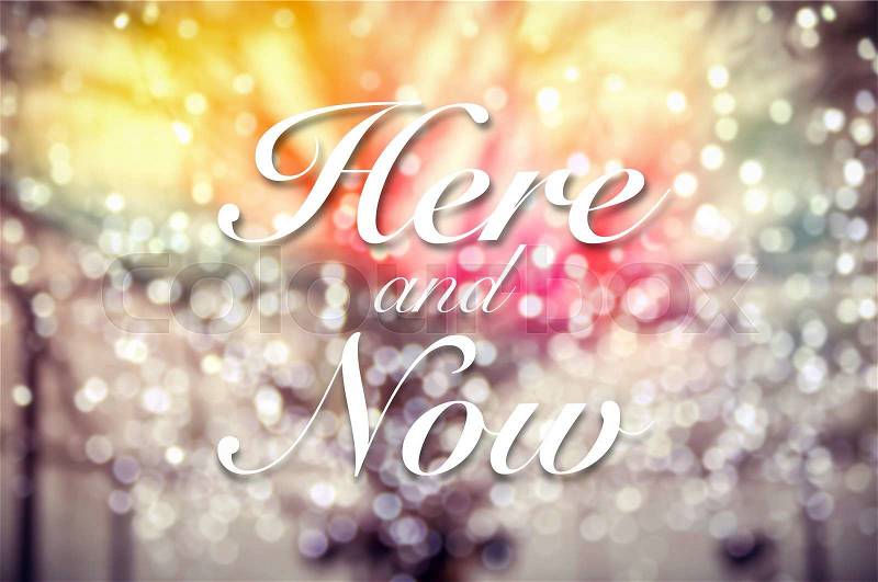 Here and Now typographic word on abstract and glitter bokeh lights background, vintage and retro style image, stock photo