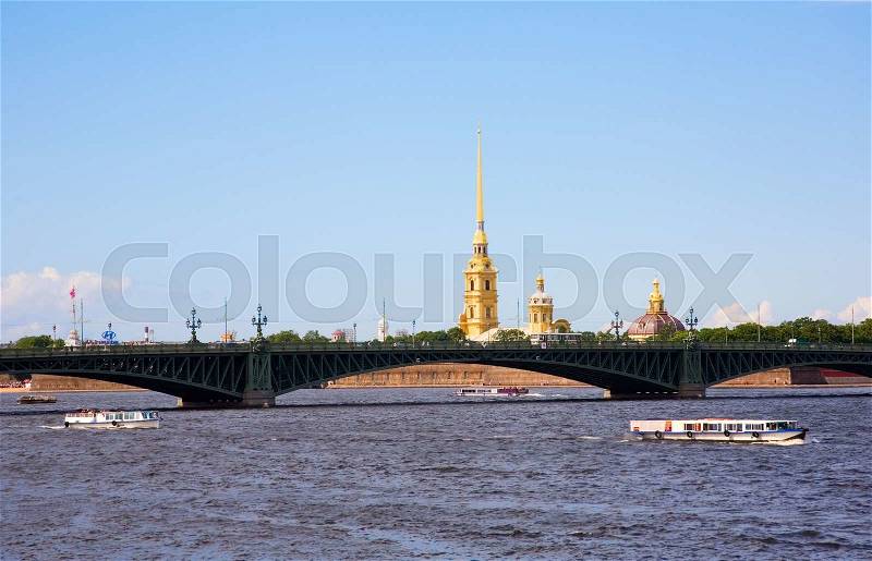 Boat excursions on the Neva river in St.Petersburg, Russia. View of Peter and Paul Fortress and Trinity Bridge, stock photo