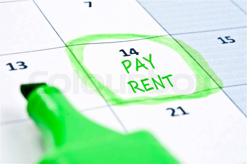 Calendar mark with Pay rent, stock photo
