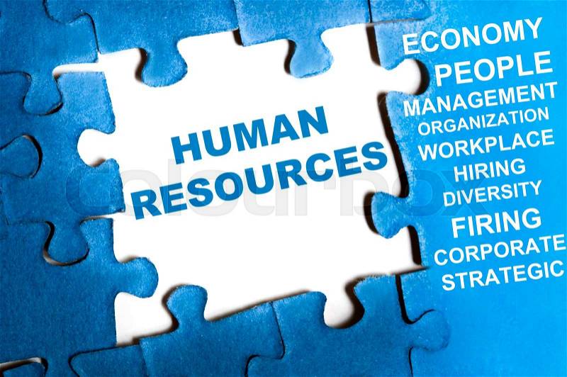 Human resource blue puzzle pieces assembled, stock photo