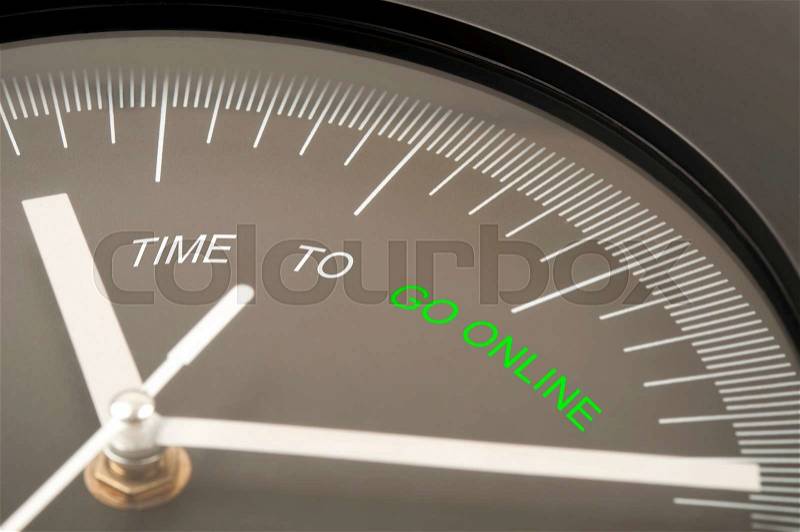 Time to go online text on clock, stock photo