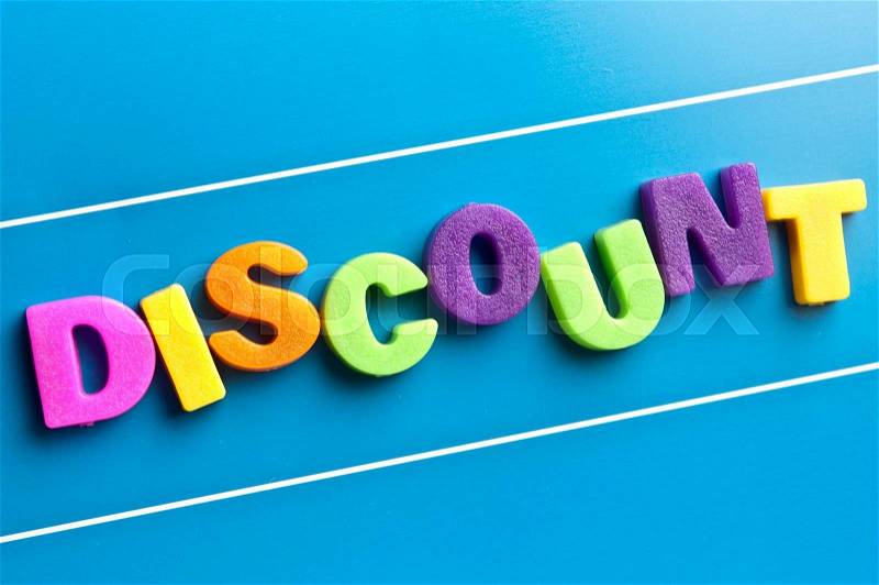 Discount word on blue board, stock photo