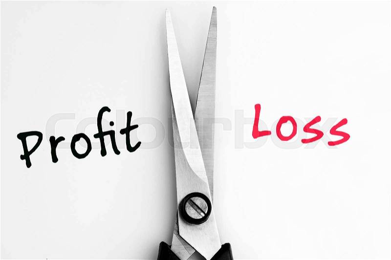 Profit and Loss words with scissors in middle, stock photo