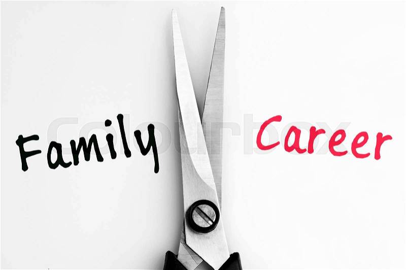 Family and Career words with scissors in middle, stock photo