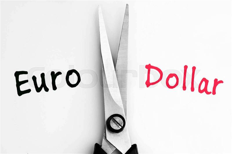 Euro and Dollar words with scissors in middle, stock photo