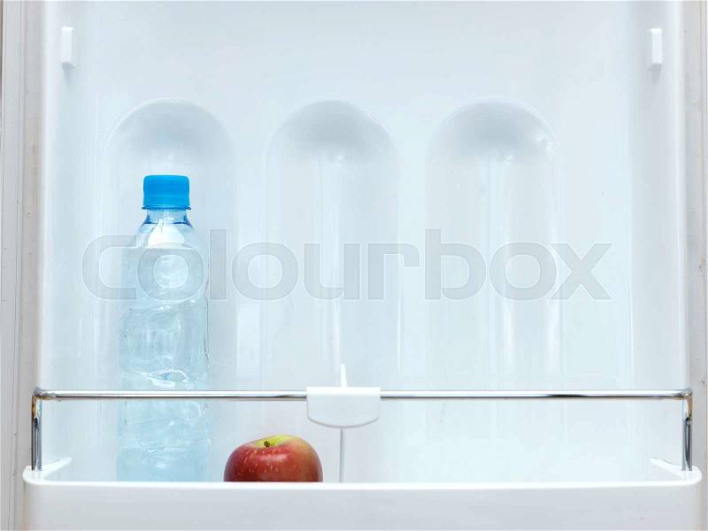 A shot of an open bar fridge, stock photo